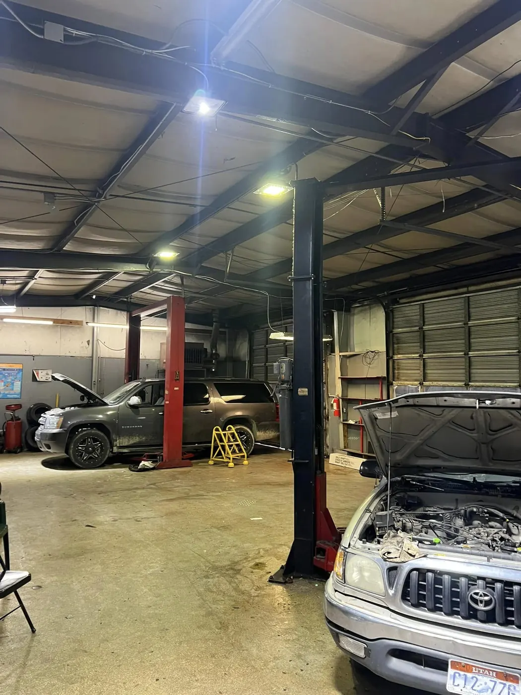 An SUV raised in the service bay
