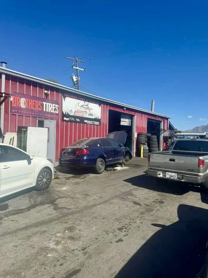 Customer cars parked in front of the shop