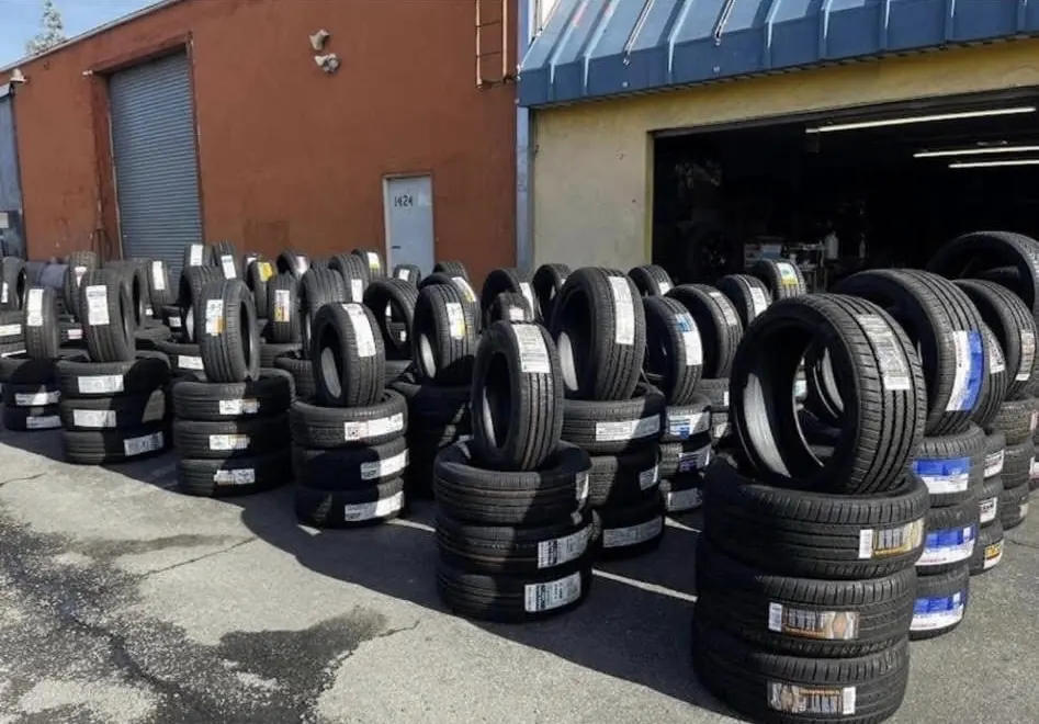 Tires lined up in the shop lot