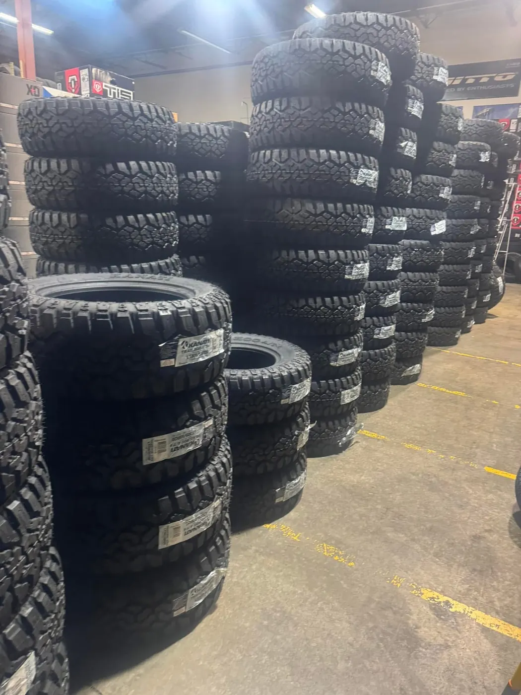 Tires stacked outside the shop